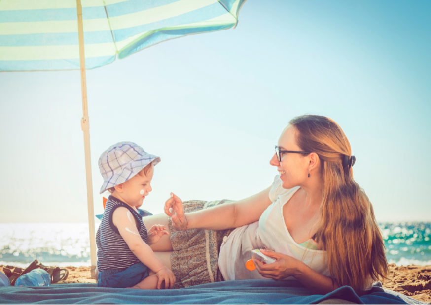 Schattenplatz, Hut, Sonnencreme, Kleidung: so schützt du dein Baby vor Sonne